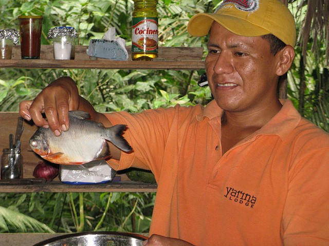Marcelo Holding Fish for Dinner